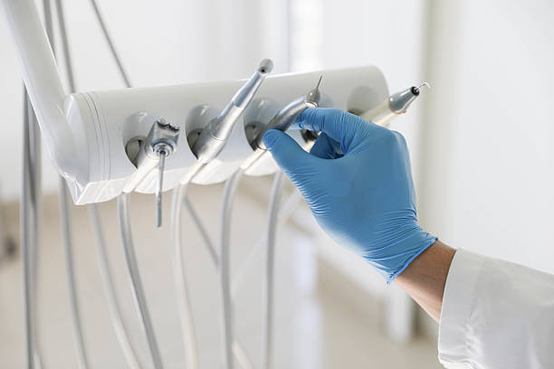 Professional Dental Implants technician working in Mallory, WV